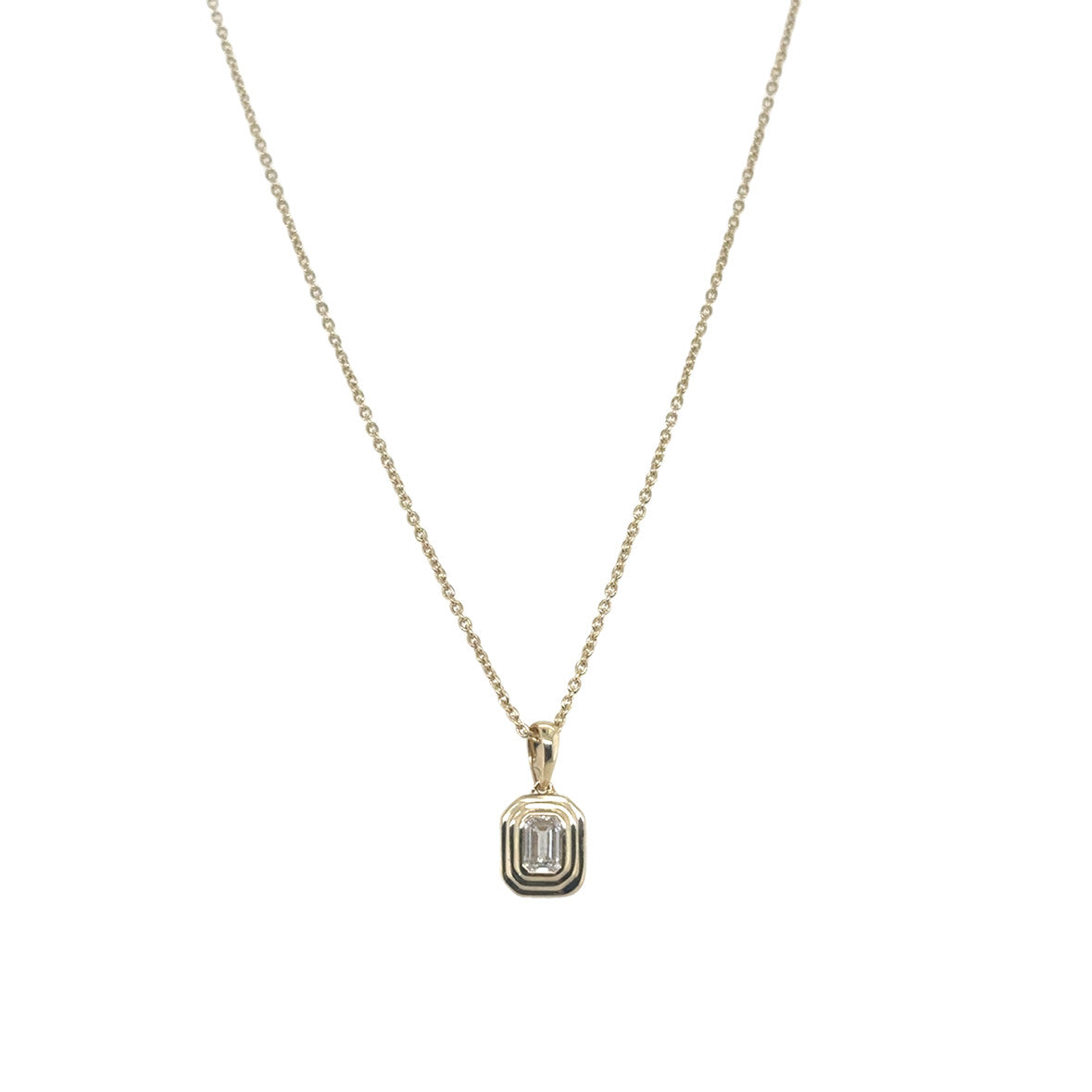 14KY Bezel Set 0.20 ct Emerald Cut Solitaire Pendant