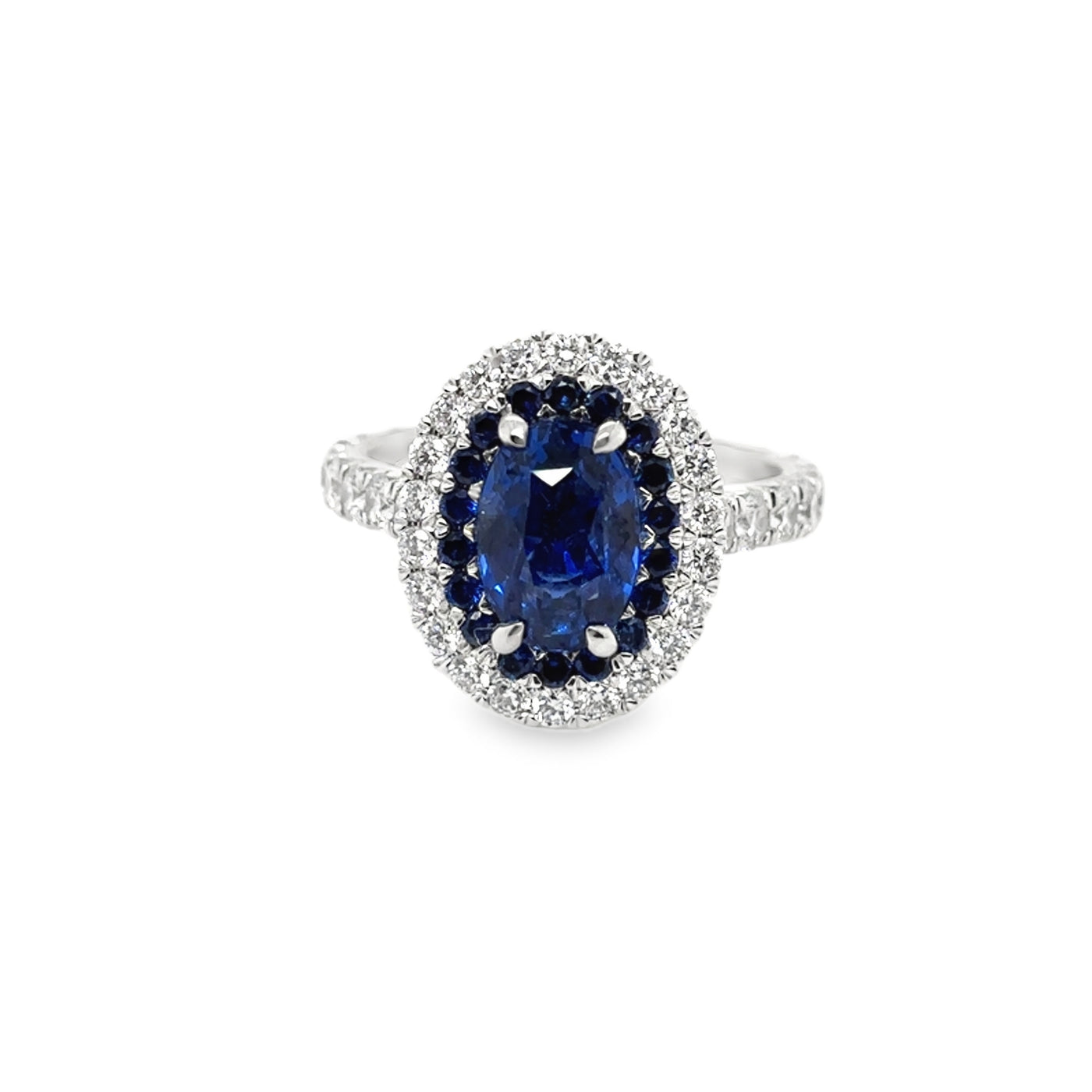 RS 18KW Oval Unheated Ceylon Sapphire and Diamond Ring