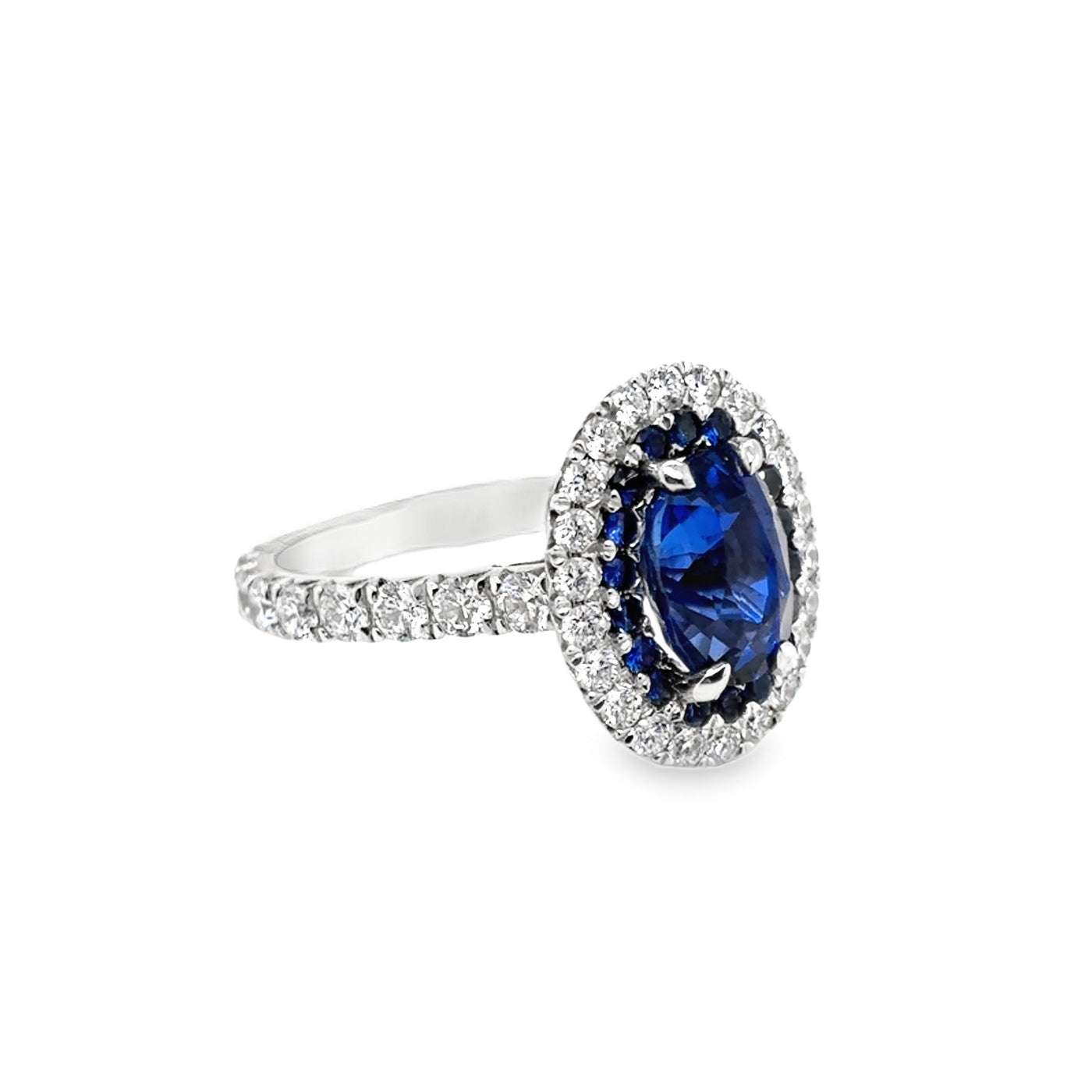 RS 18KW Oval Unheated Ceylon Sapphire and Diamond Ring