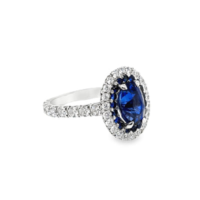 RS 18KW Oval Unheated Ceylon Sapphire and Diamond Ring